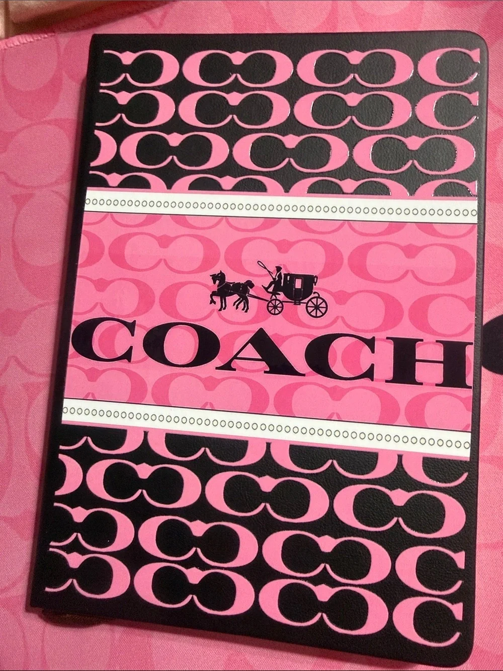 Pink & black journal w/ matching pen, keychain, desk mat and fan.